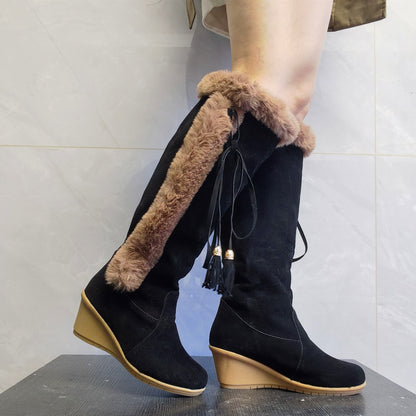 Great boots with a wedge heel in a boho style